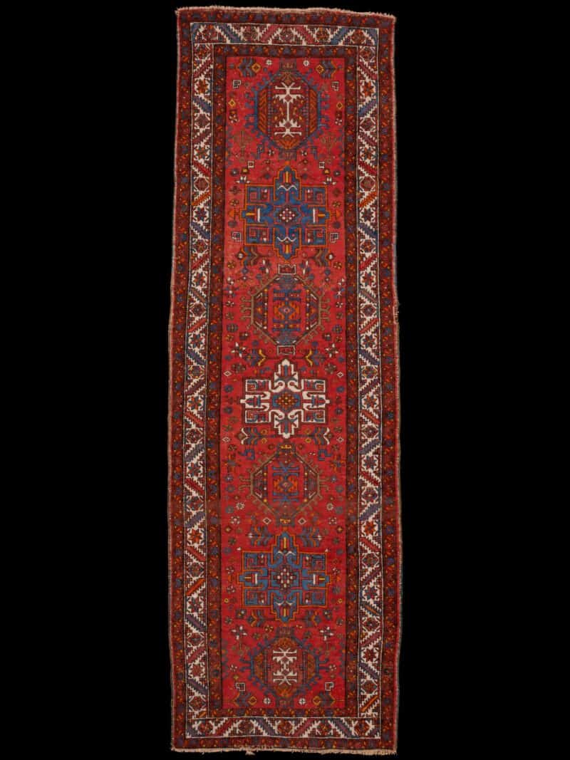 Punainen käsinsolmittu Heriz-villamatto, 327 × 103 cm