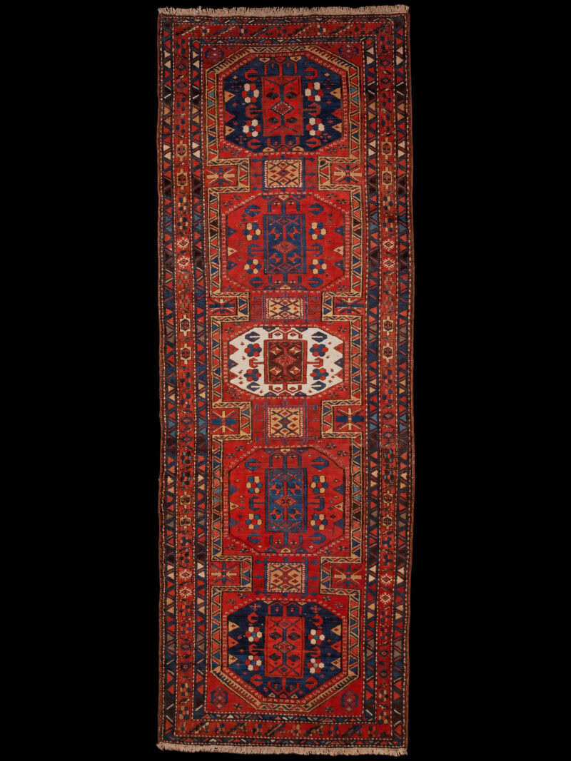 Punainen käsinsolmittu Heriz-villamatto, 321 × 122 cm